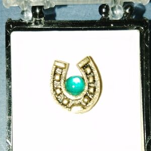 Elegant Gold and Turquoise Pendant Horse Shoe Surrounding The Plastic Gem.